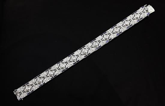 An attractive 1920s/1930s platinum, synthetic sapphire and diamond set bracelet, 7in.